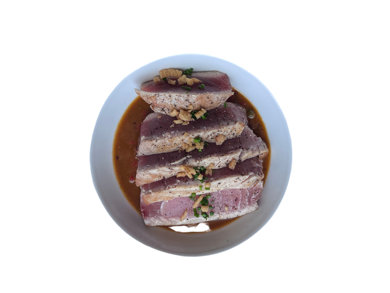 Grilled tuna with black pepper and herbs with Escabeche      